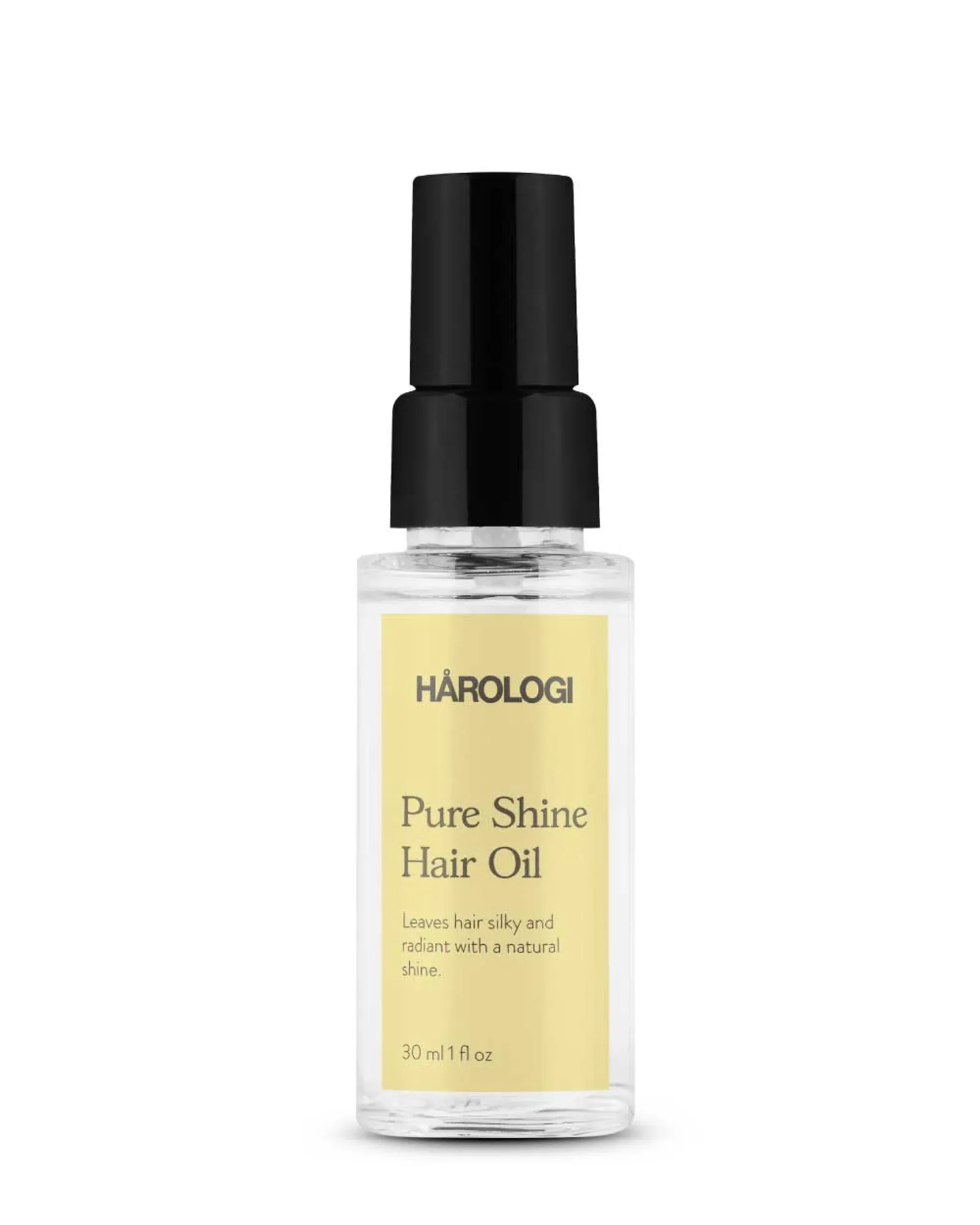 Gjennomsiktig plastflaske med gul etikett og sort pumpe. Hair Oil – Lett hårolje med glans og frizzkontroll